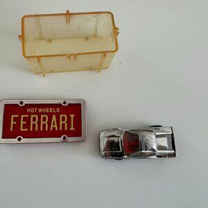 Lot 064 – Hot Wheels/Small Toys.  Sold As Is.  Car and Box